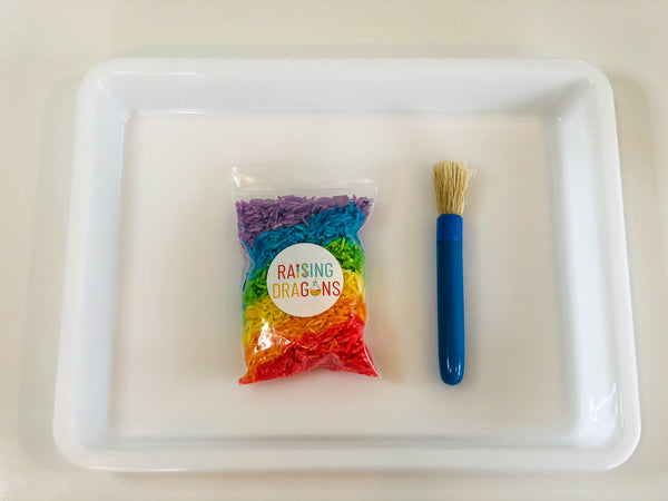 Raising Dragons Sensory Writing Tray with Brush and Rainbow Rice